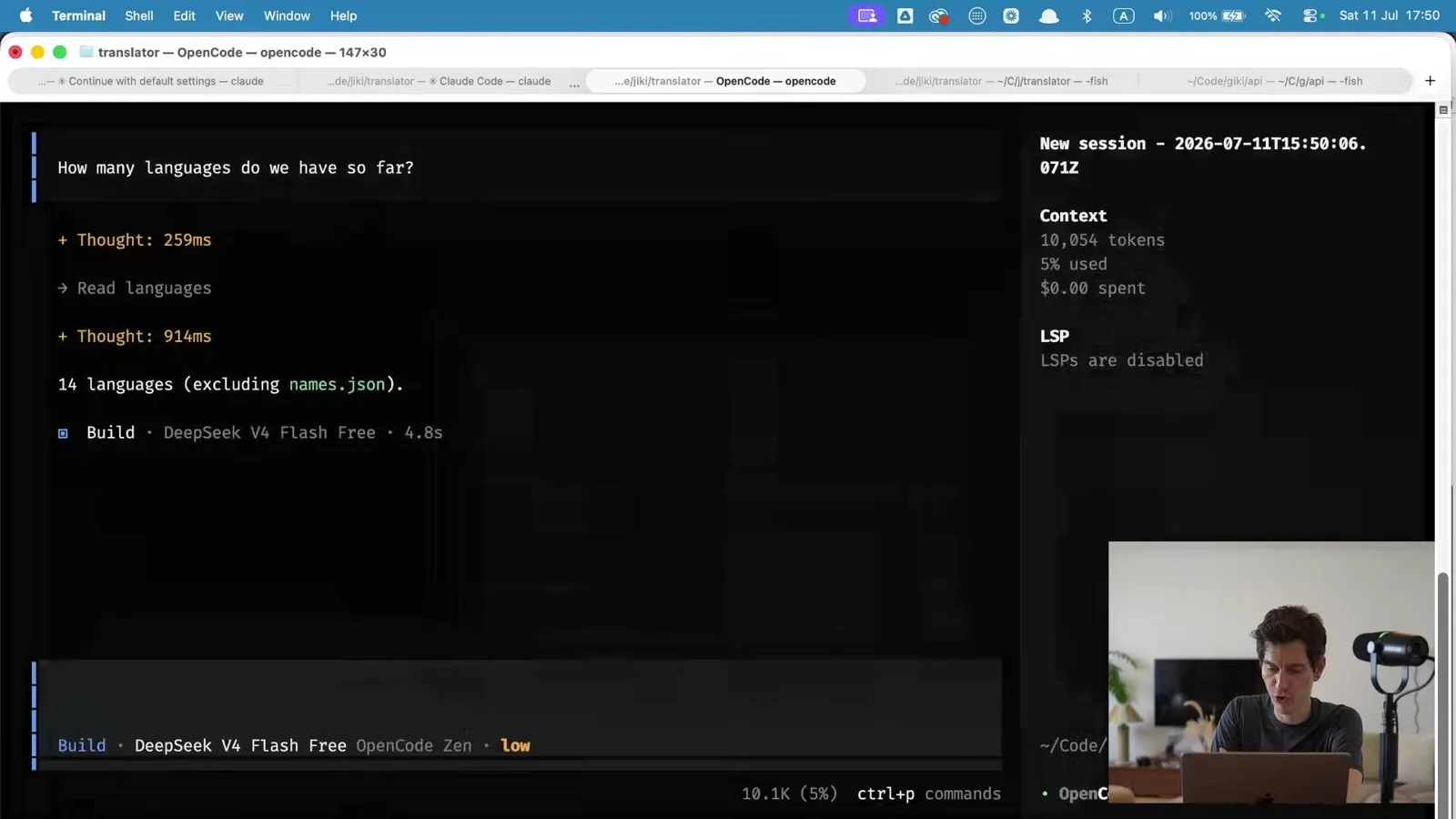 OpenCode in the terminal answering "How many languages do we have so far?", with a context panel on the right showing 10,054 tokens used.