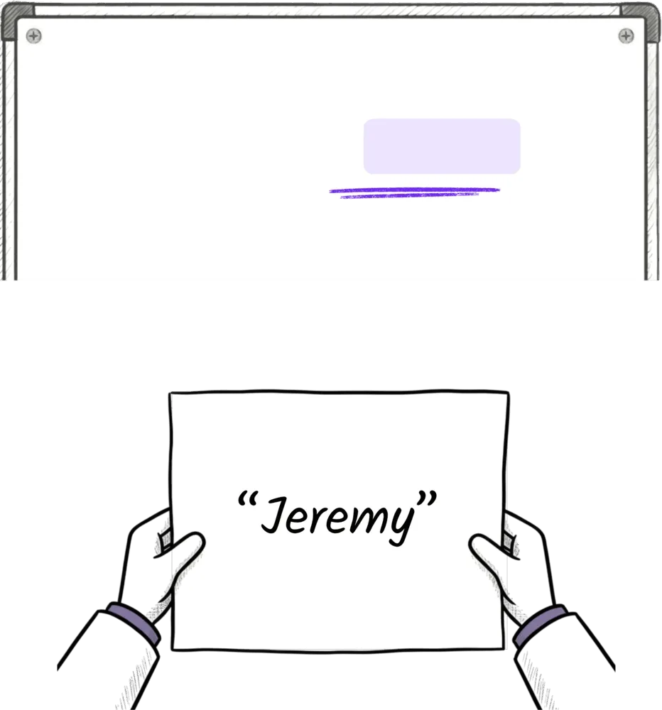 Jiki holding a piece of paper with the string Jeremy written on it, ready to put into the box